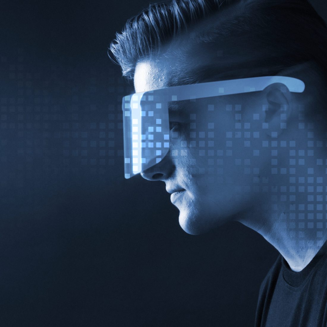 Man in glasses augmented reality blue